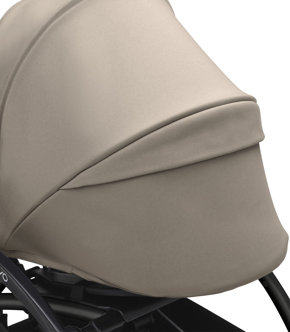 Stokke® YOYO3® 0+ Taupe. Black Frame. Canopy ventilation closed. Close-up. Angled. galery image 5